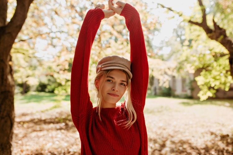beautiful-blonde-girl-feels-happy-autumn-park-lovely-younf-woman-red-sweater-posing-leaves